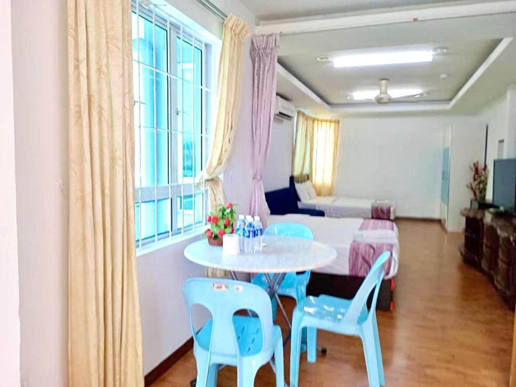 OYO 1103 Borneo Inn Kota Kinabalu Quarto foto