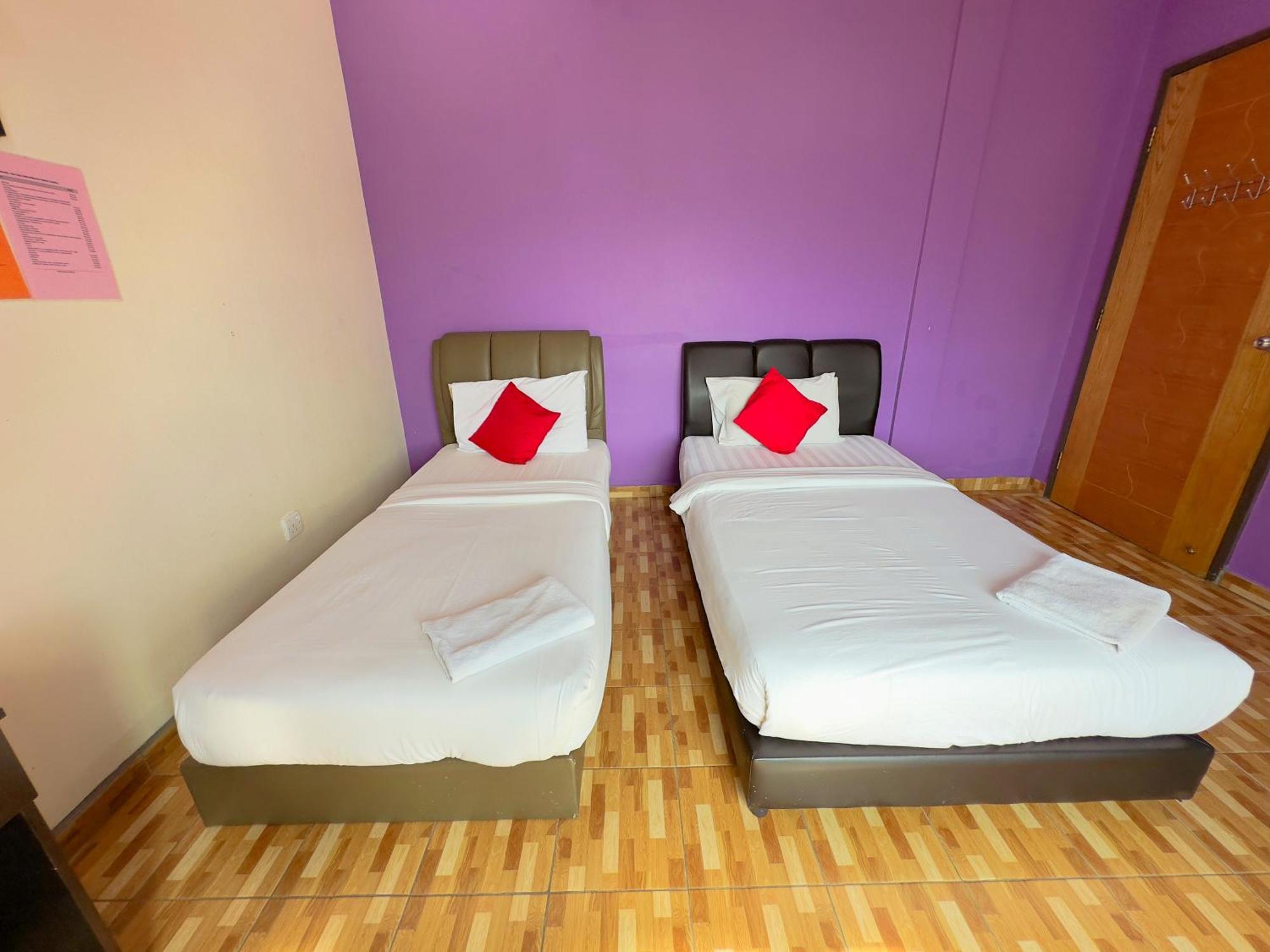 OYO 1103 Borneo Inn Kota Kinabalu Quarto foto